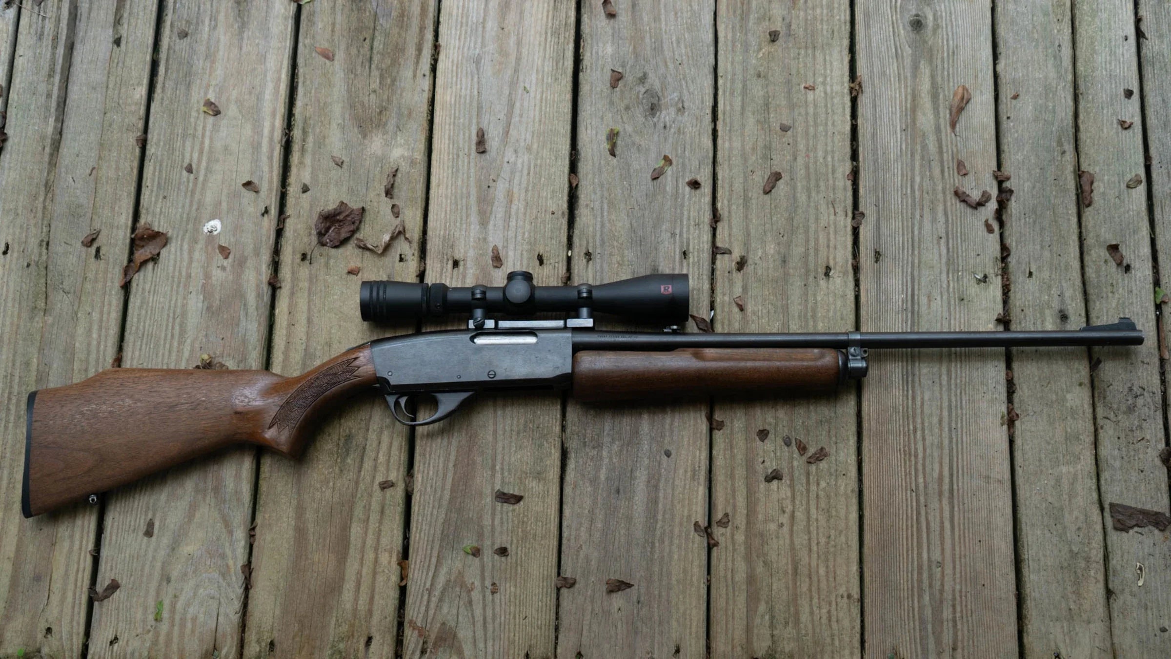 Hunting rifle on wood deck - worst hunting rifles of all time