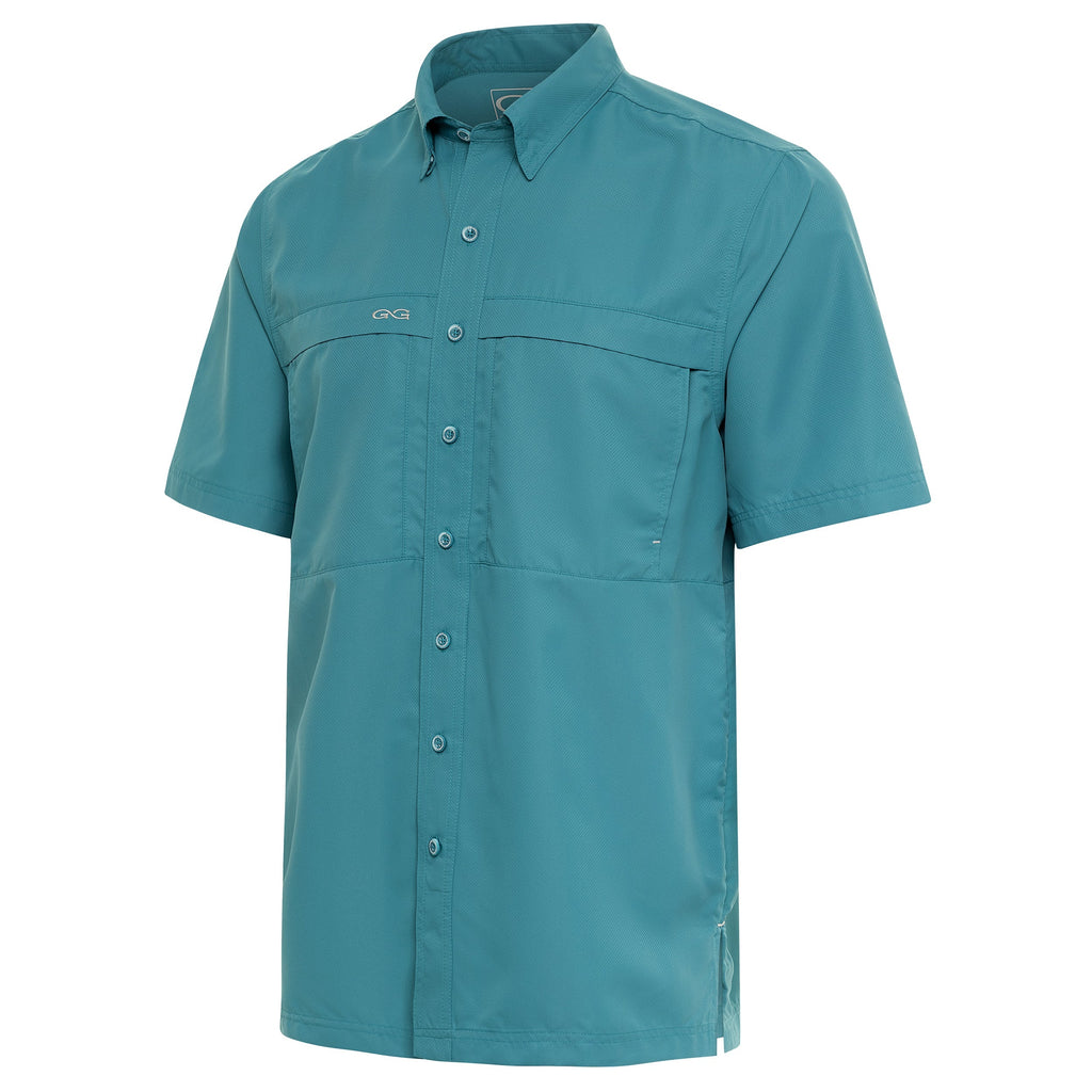 Teal short sleeve button-up hunting shirt with chest pockets and GGG logo, ideal for outdoor adventures