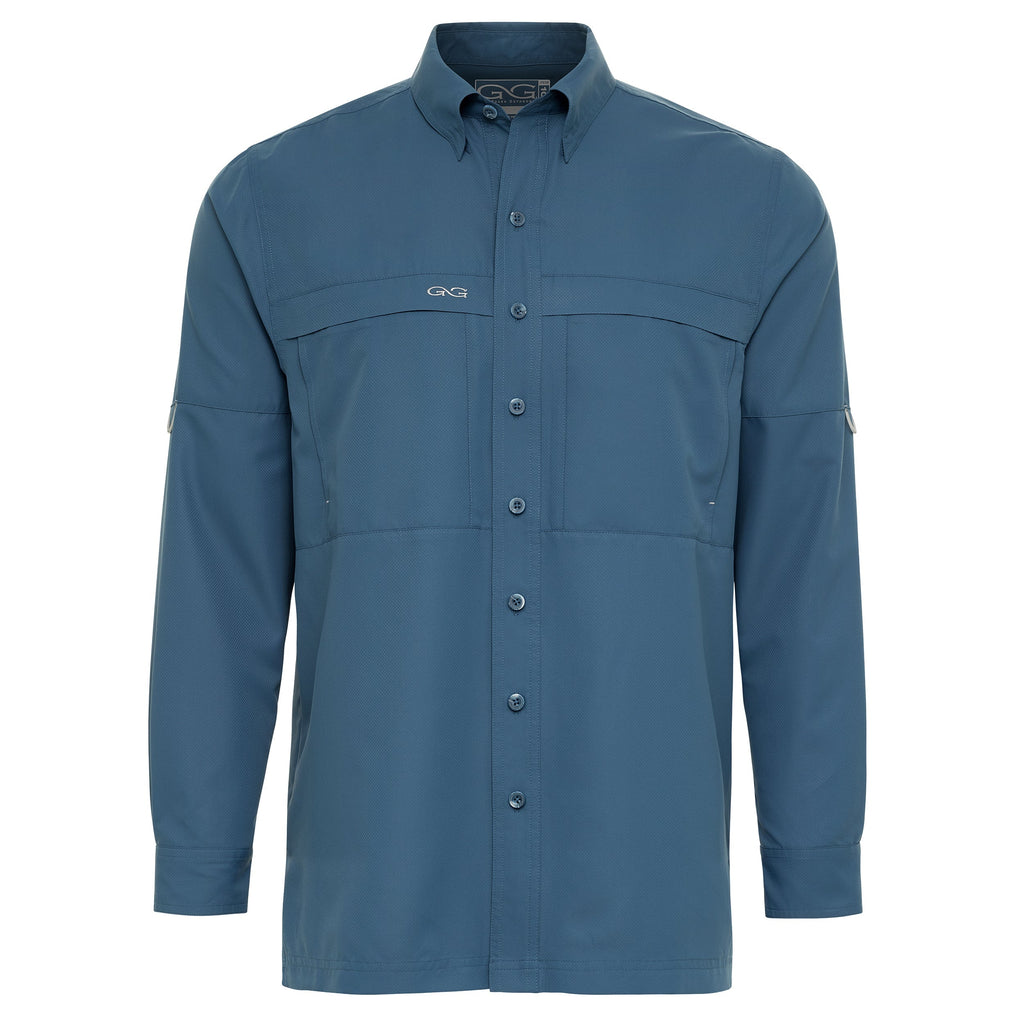 Men's blue long sleeve hunting shirt with button front, chest pockets, and roll-up sleeves for outdoor adventures