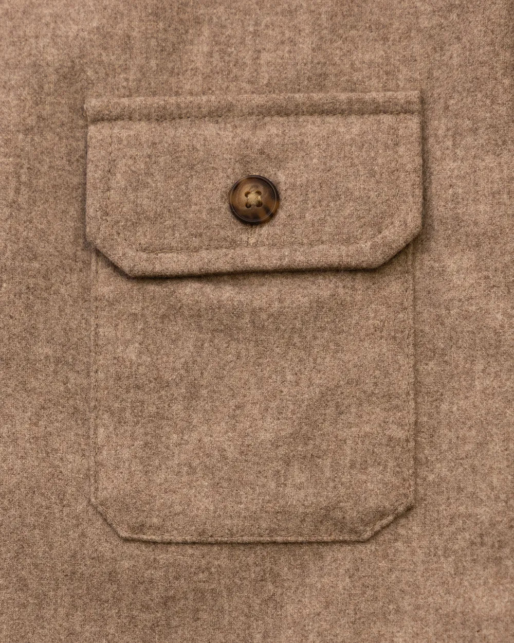 Button flap chest pocket on the Oatmeal merino wool overshirt