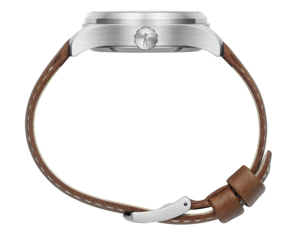 Side view of the Ball and Buck x Luminox field watch showing the screw-down crown and leather strap