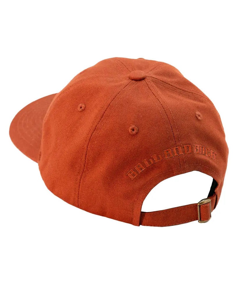 Burnt Orange Arthur Core Hat, back view with adjustable fabric strap