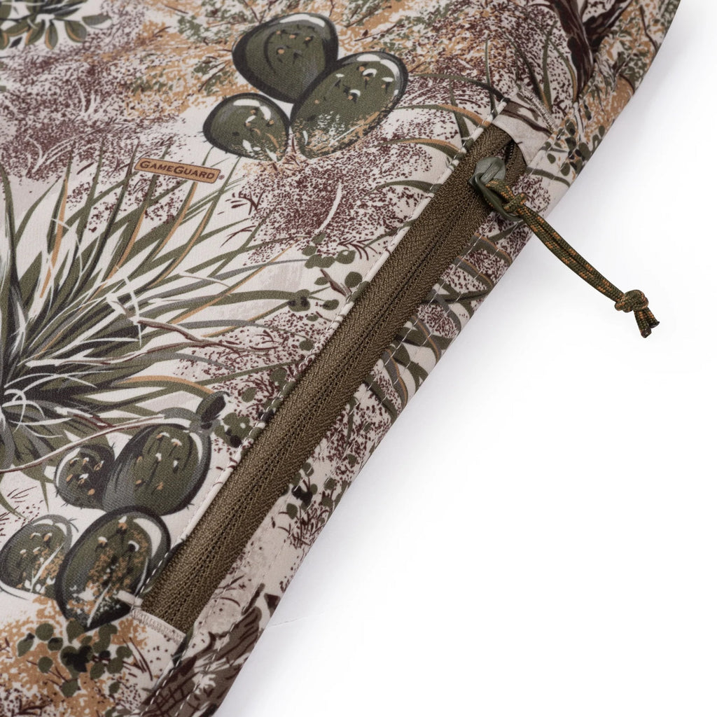 GameGuard camo hunting gear with cactus print, olive zipper, and drawstring closure for outdoor use