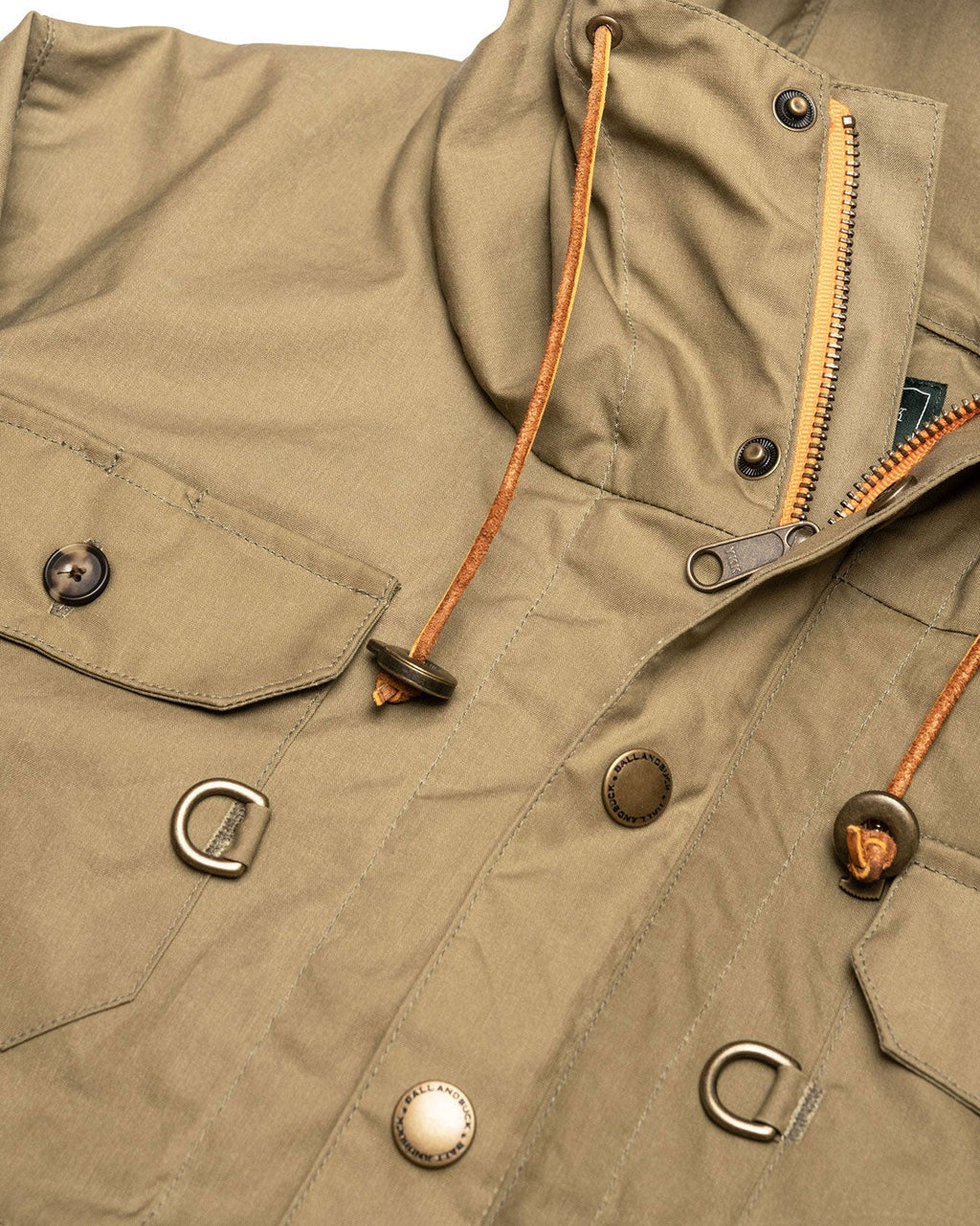 Leather cord drawstrings and D-rings on the Waxed Cotton Anorak chest