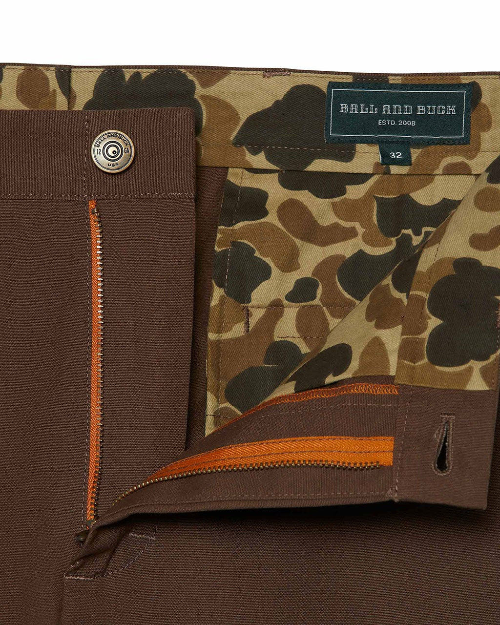 Waistband, brass button and camo pocket lining on the Bark Heritage Pant
