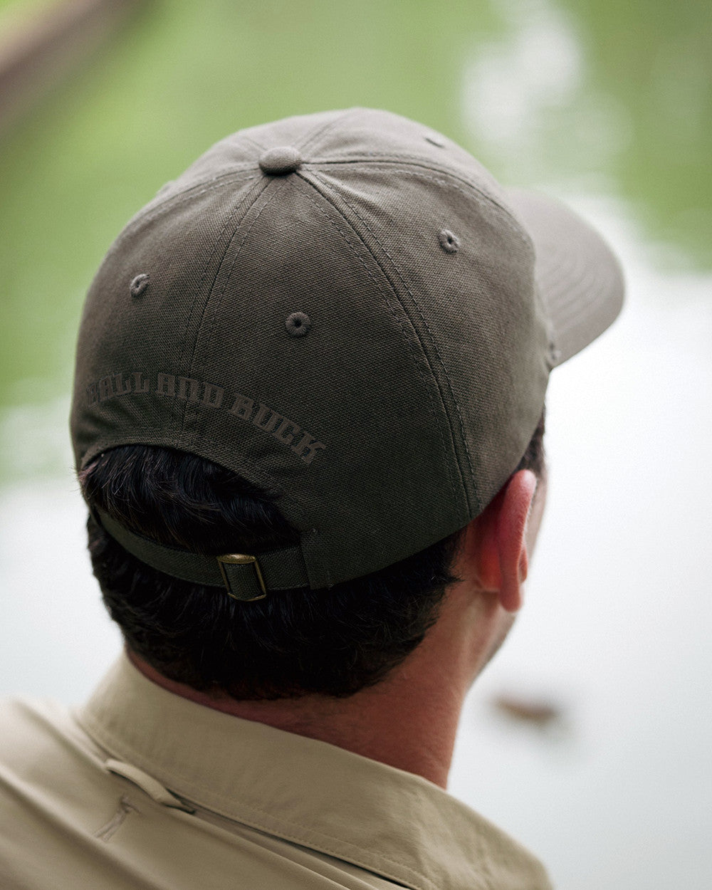 Olive Green Arthur Core Hat worn, back of head view