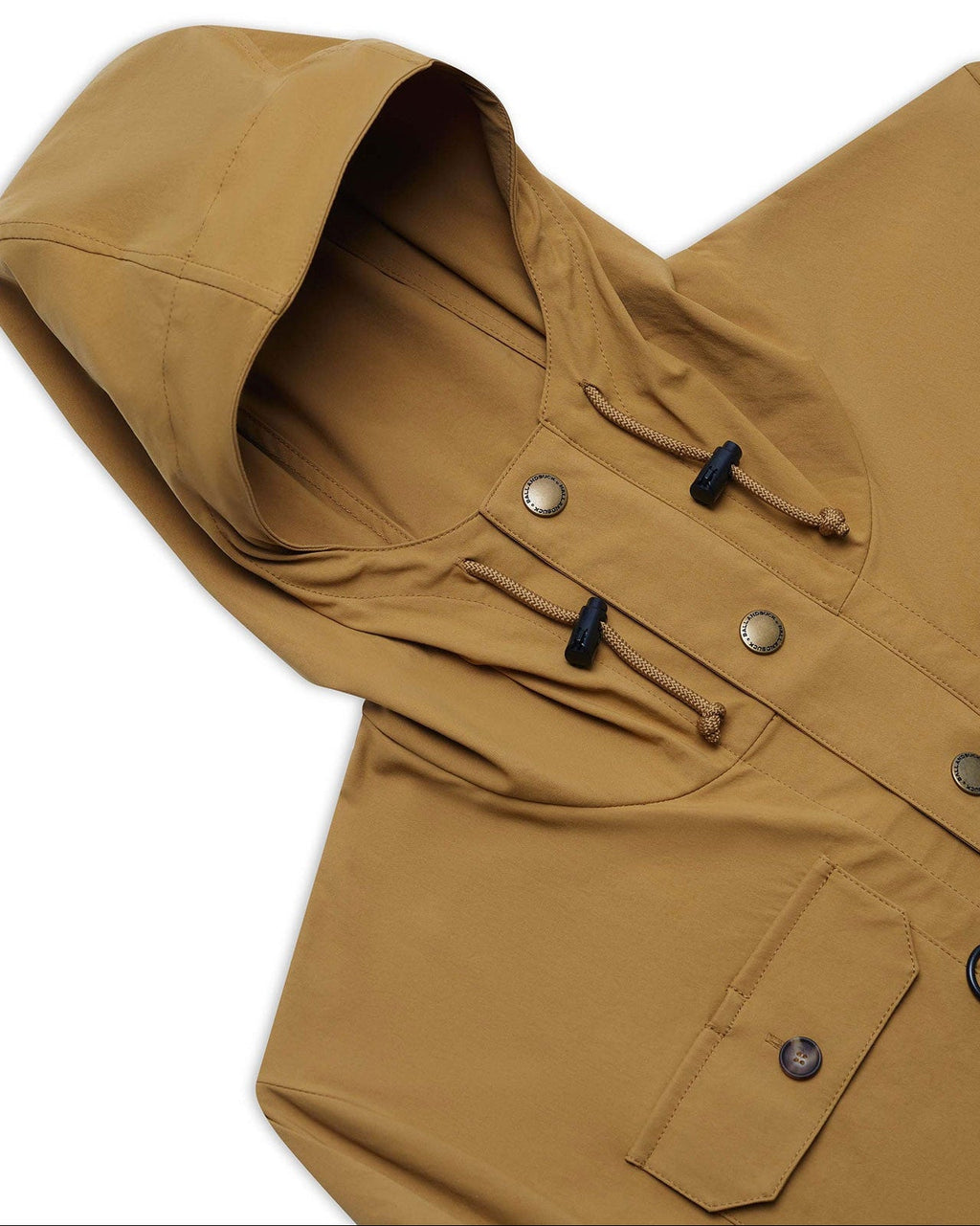 Hood and paracord drawstrings on the tan Active+ Anorak