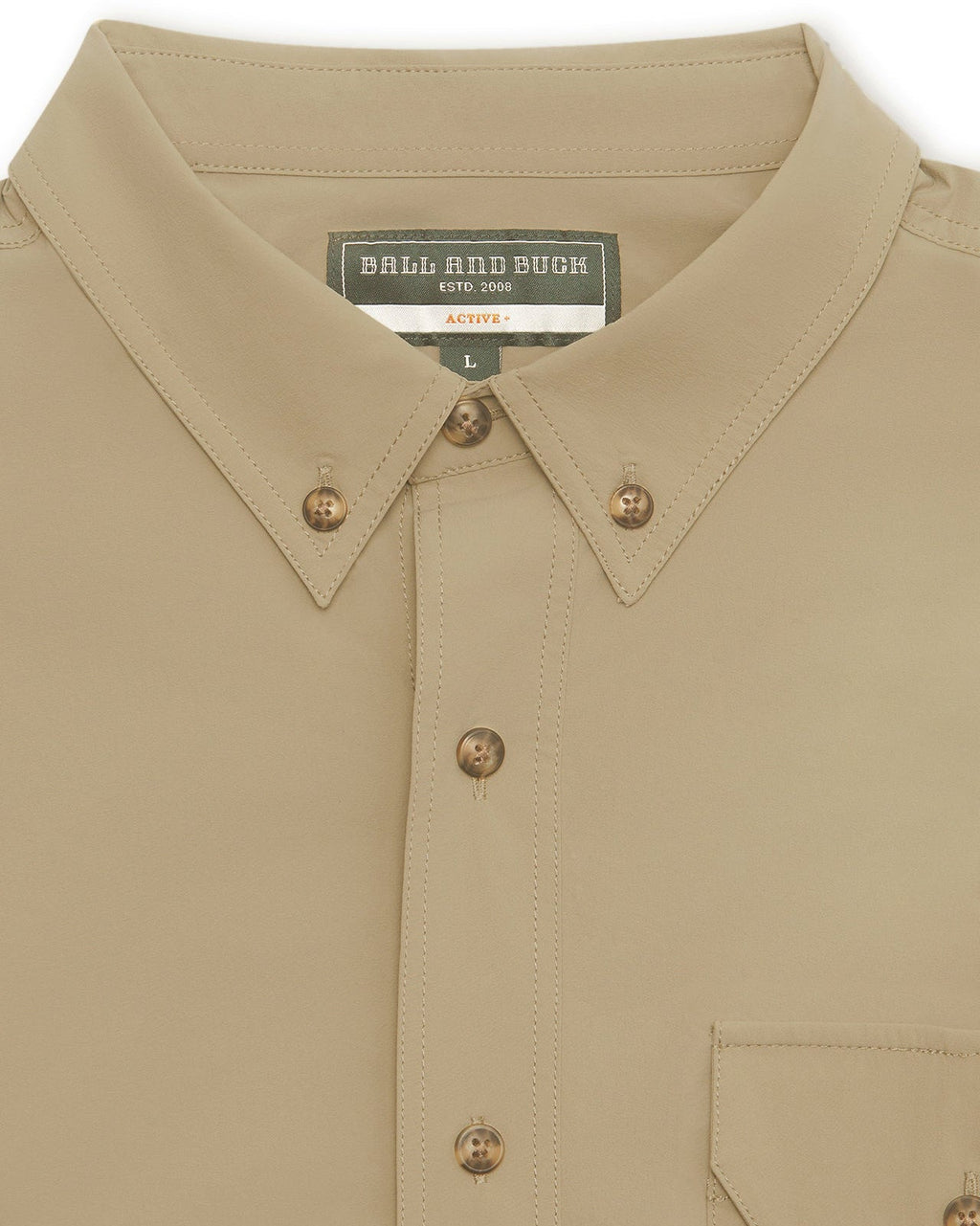 Button-down collar and label on the Tan Active+ Guide Shirt