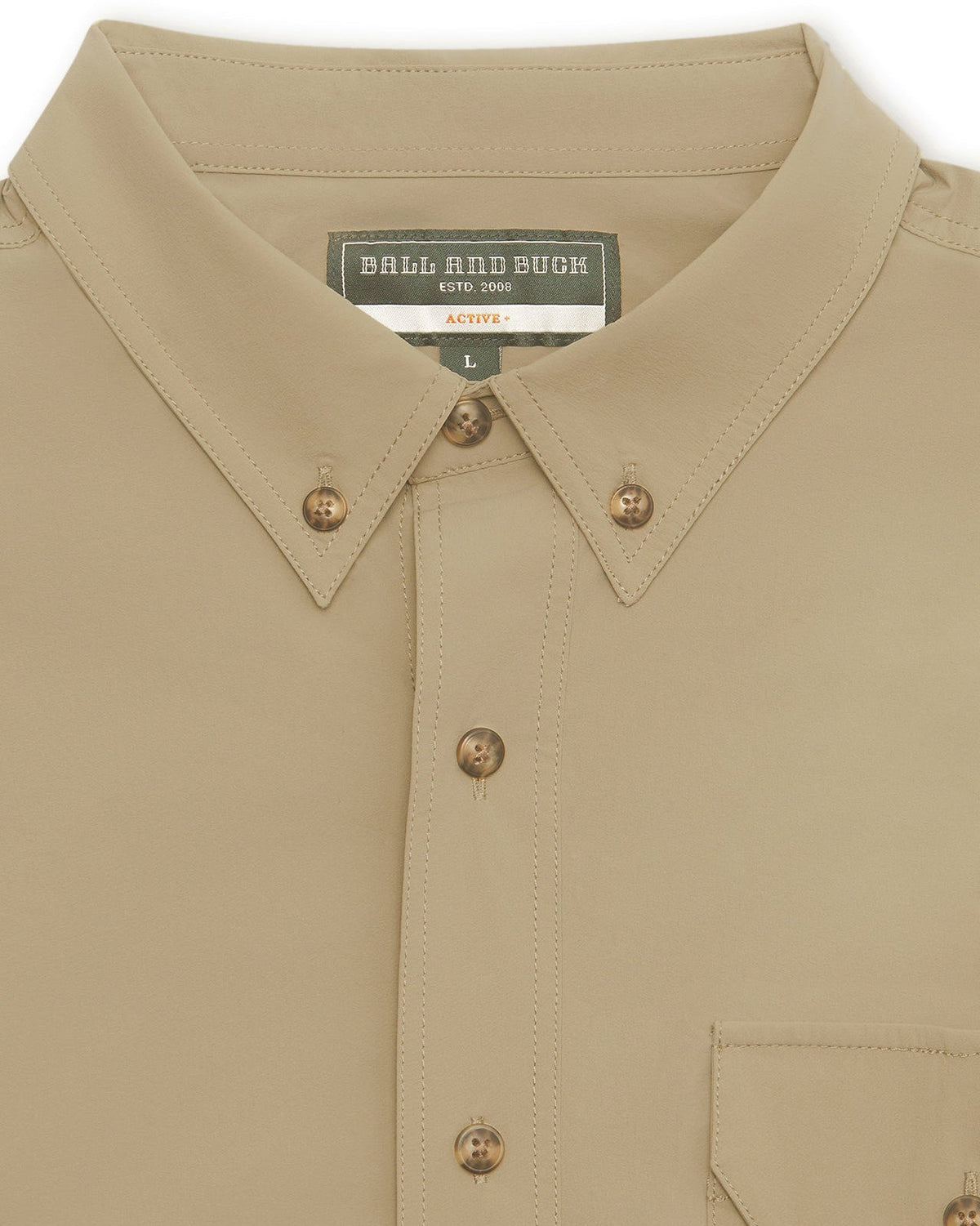 Button-down collar and label on the Tan Active+ Guide Shirt