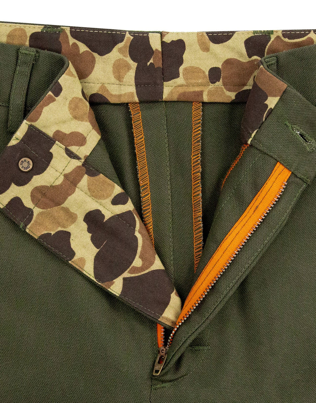 Blaze orange zip fly and Original Camo pocket lining on the Pine Duck Field Pant