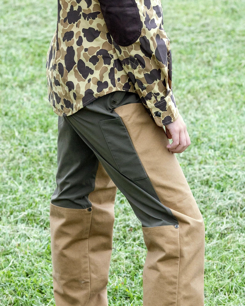 Side view of the Loden Active+ Joan Field Pant worn in grass
