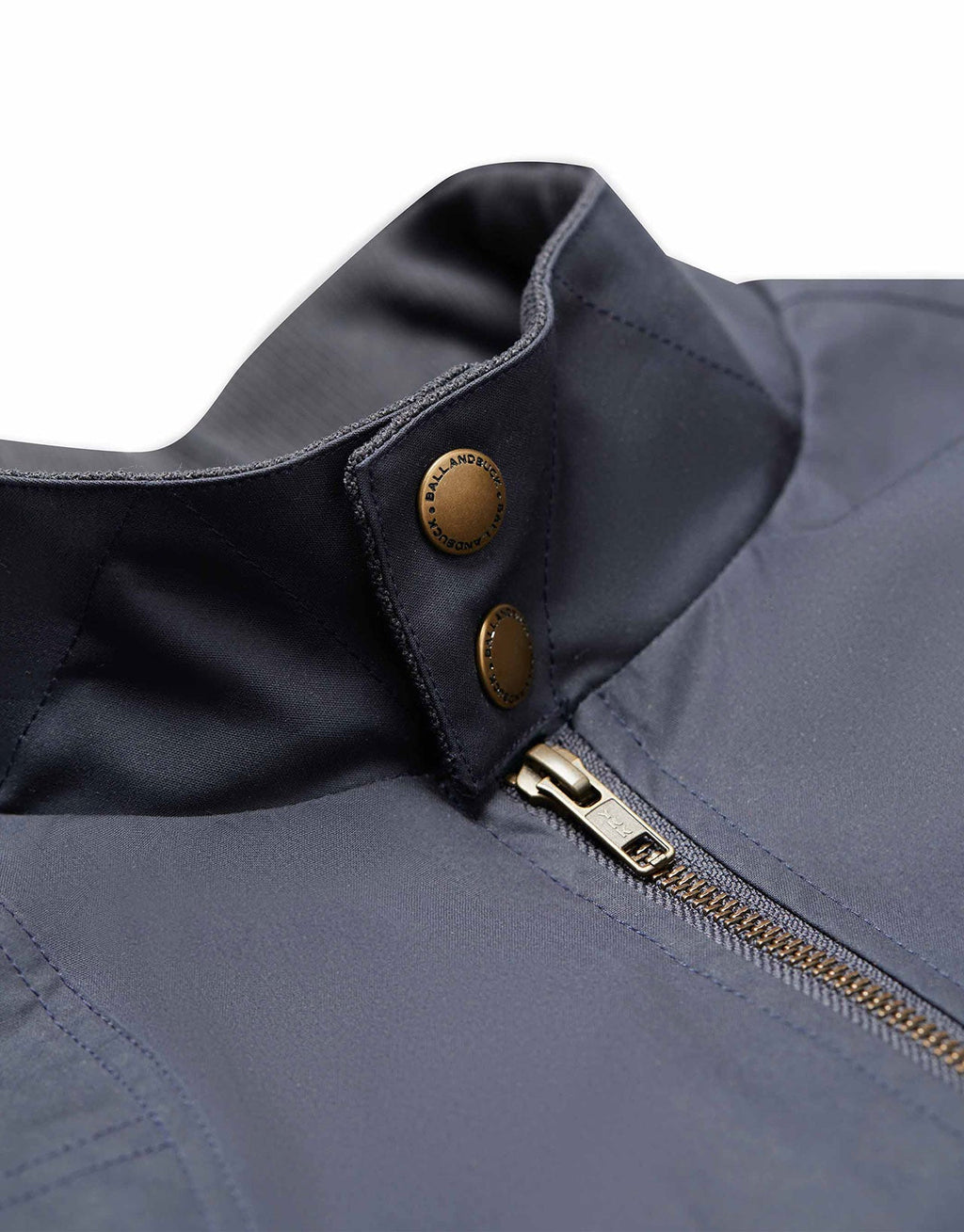 Brass snap collar tab on the Navy Blue Harrington Jacket