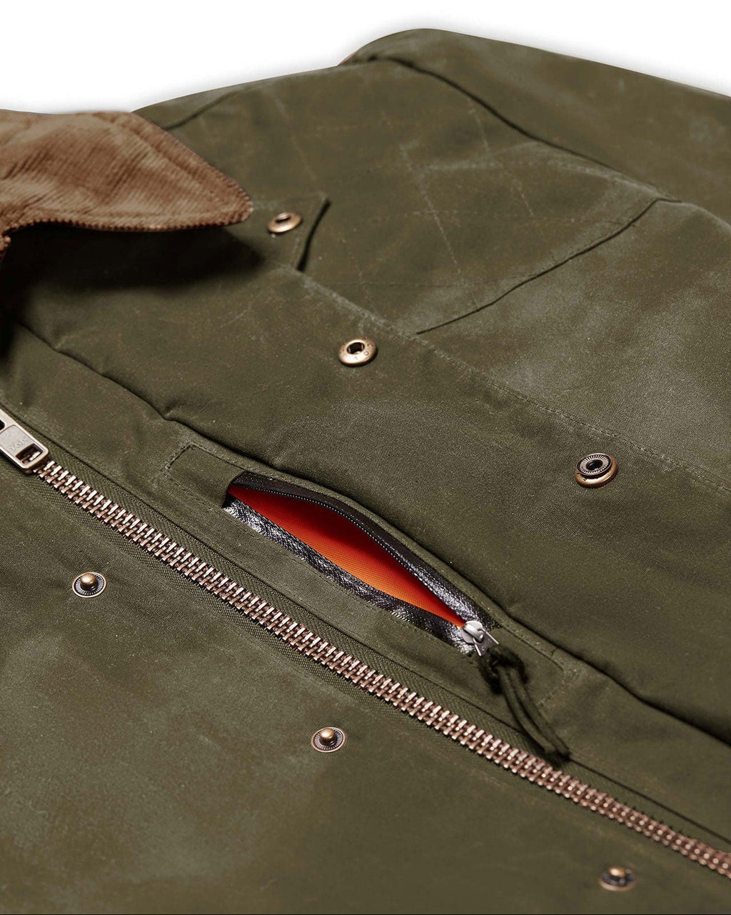 Weather shield pocket with blaze orange liner on the Olive Upland Jacket