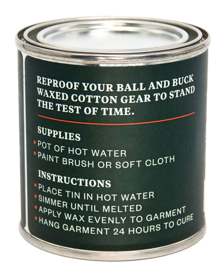 Back of the Ball and Buck Canvas Wax tin with application instructions