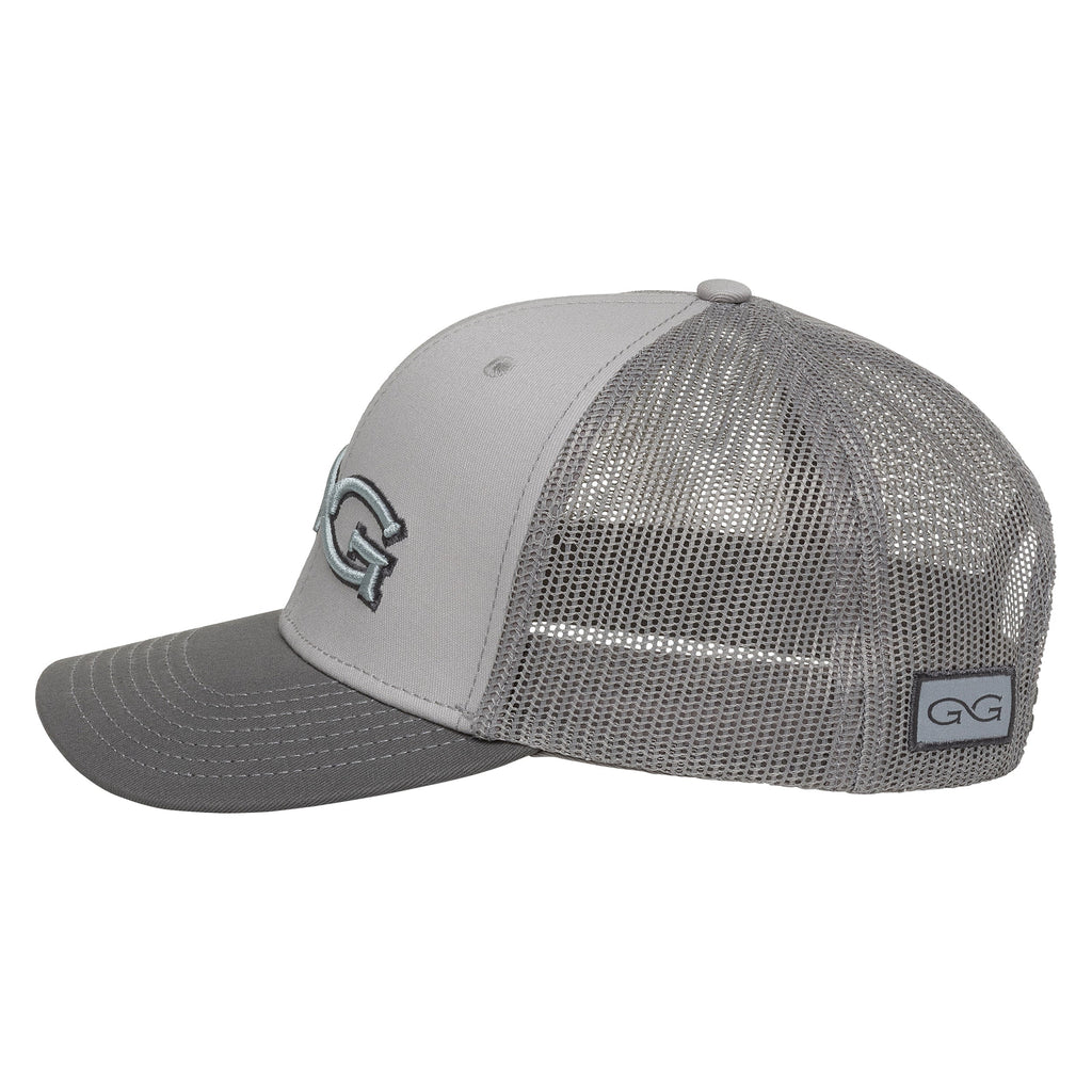 Gray mesh back trucker hat with embroidered GG logo, ideal for hunting and outdoor activities