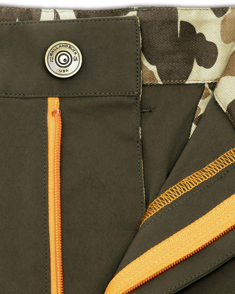 Brass shank button, blaze orange zip and camo lining on the Loden Active+ Field Pant