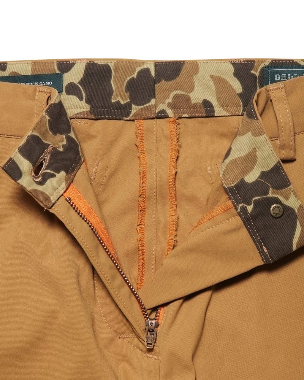 Blaze orange zip fly and camo lined waistband on the Active+ Joan Field Pant