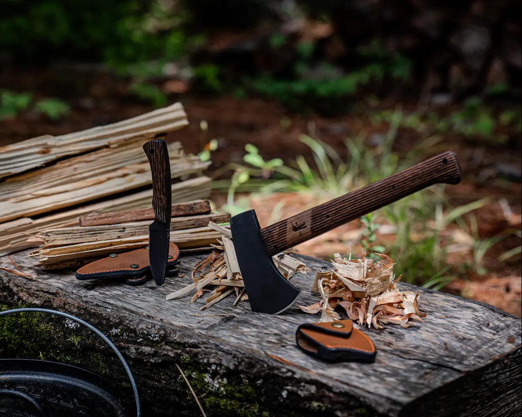 Winkler Huntsman Knife and Highland Hatchet on a log in the woods