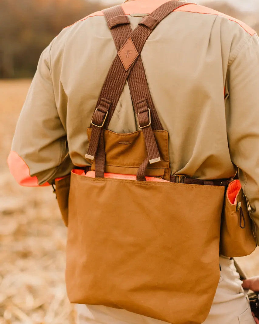 Back of the Signature Canvas Strap Vest worn, showing X-straps and game pocket