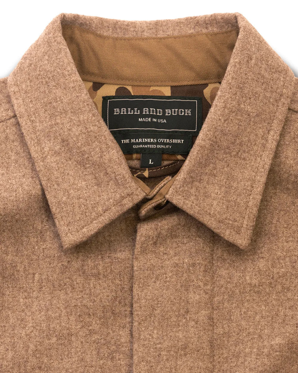 Collar and maker label on the Oatmeal Mariners merino wool overshirt