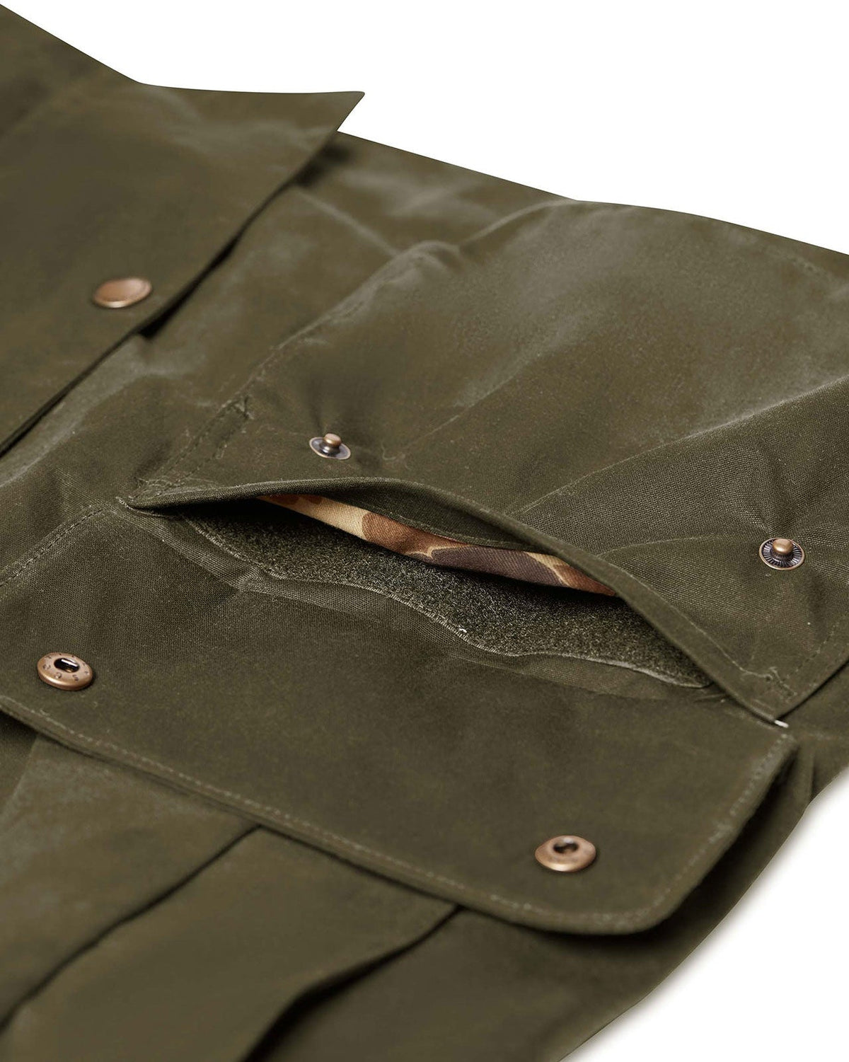 Moleskin lined hand warmer pocket on the Olive Upland Jacket