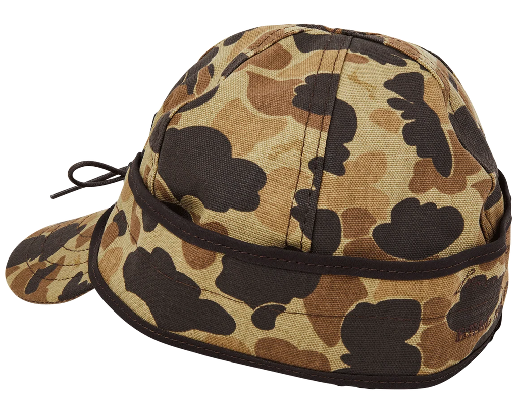 Original Camo Stormy Kromer cap from the side with the ear band up