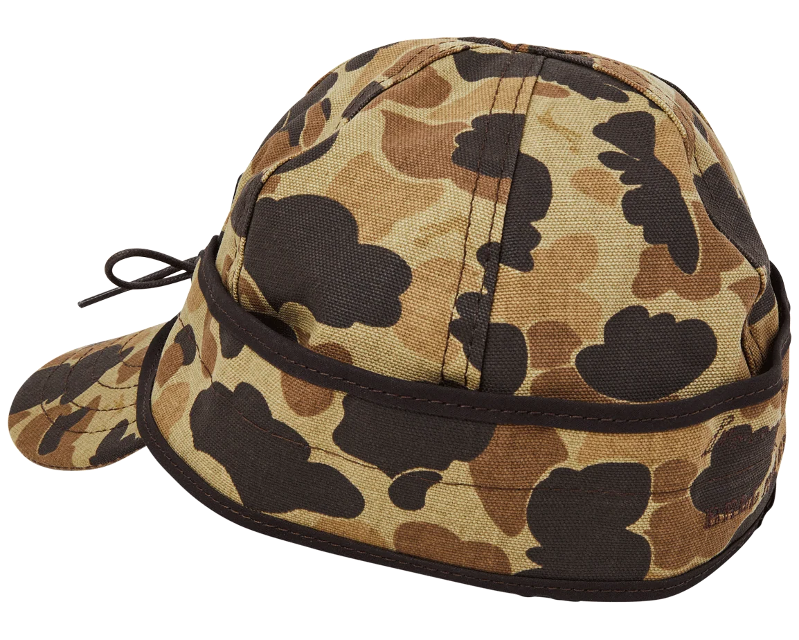 Original Camo Stormy Kromer cap from the side with the ear band up