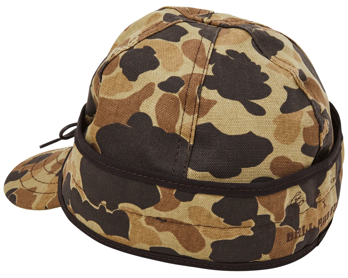 Insulated Stormy Kromer x Ball and Buck cap with the ear band pulled down