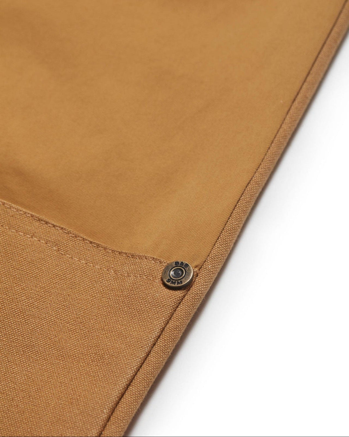 Brass rivet at the canvas reinforcement on the Active+ Joan Field Pant