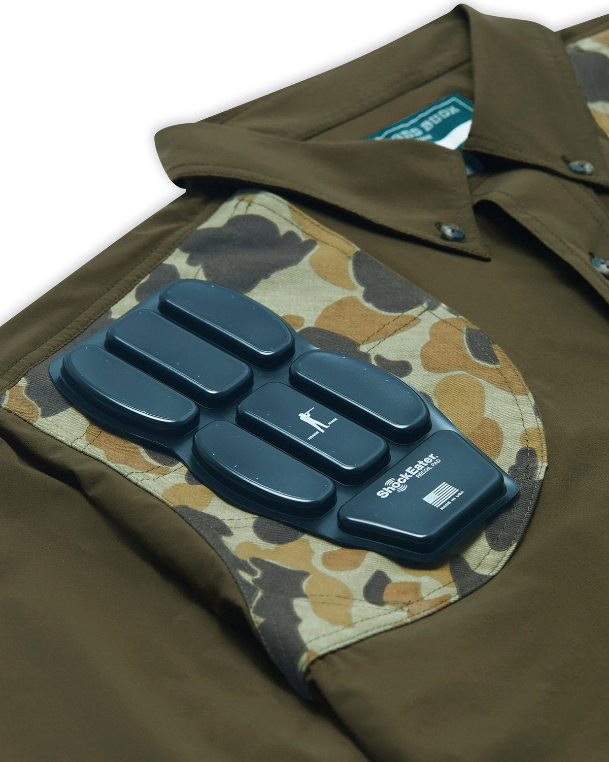 ShockEater recoil pad insert in the camo shooting shoulder of the Olive Active+ Field Shirt