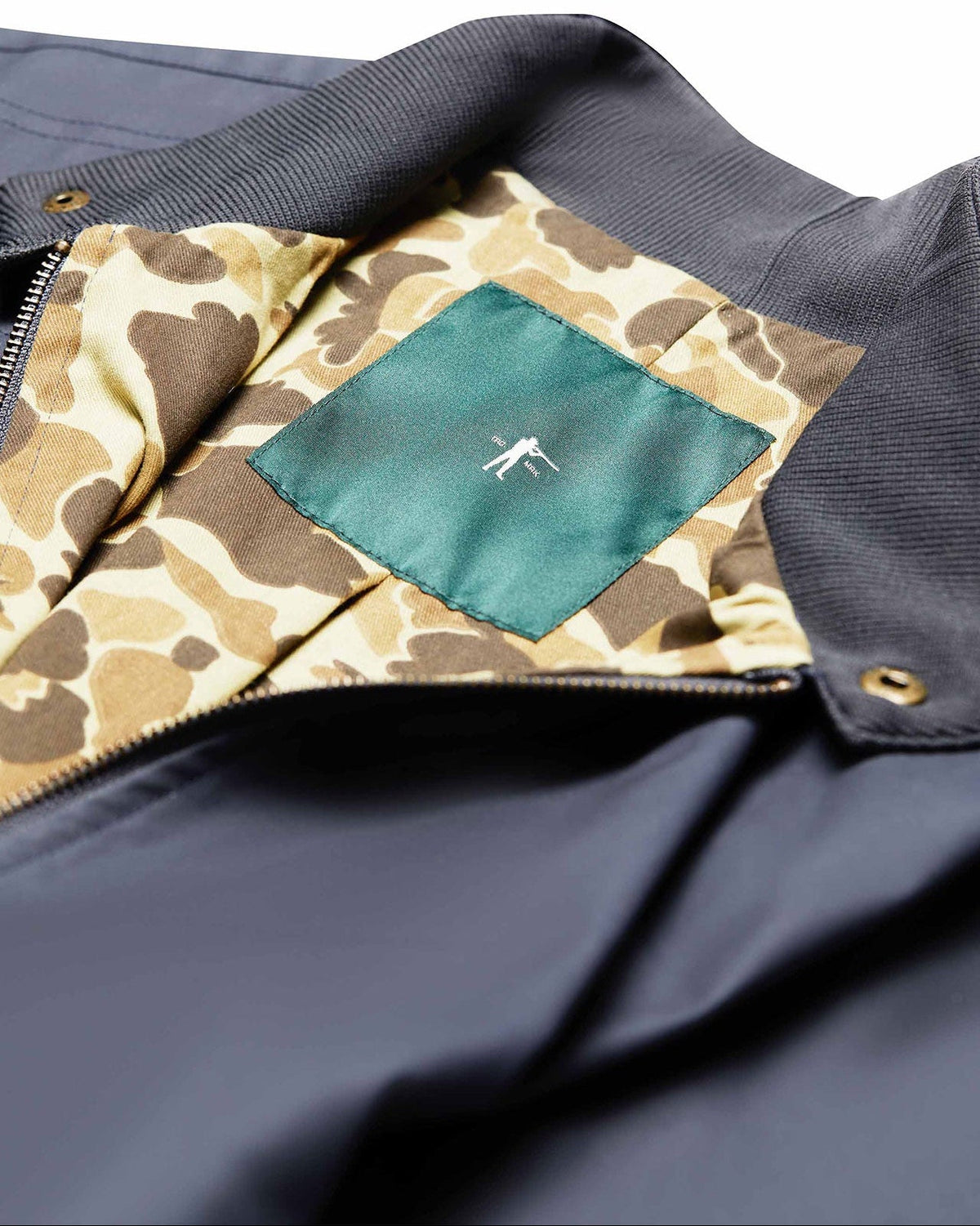 Original Camo lining and green inner label of the Navy Blue Harrington Jacket