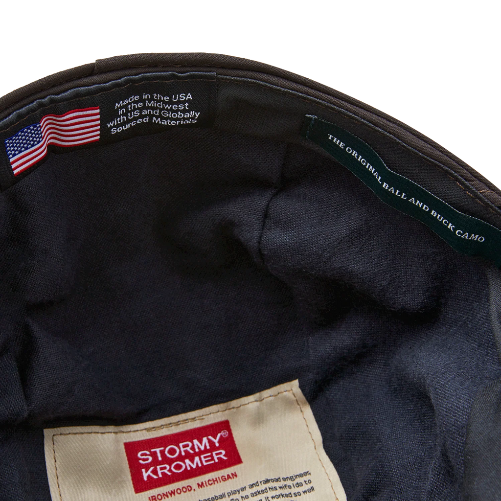 Cotton flannel lining and USA flag label inside the Original Camo Stormy Kromer cap