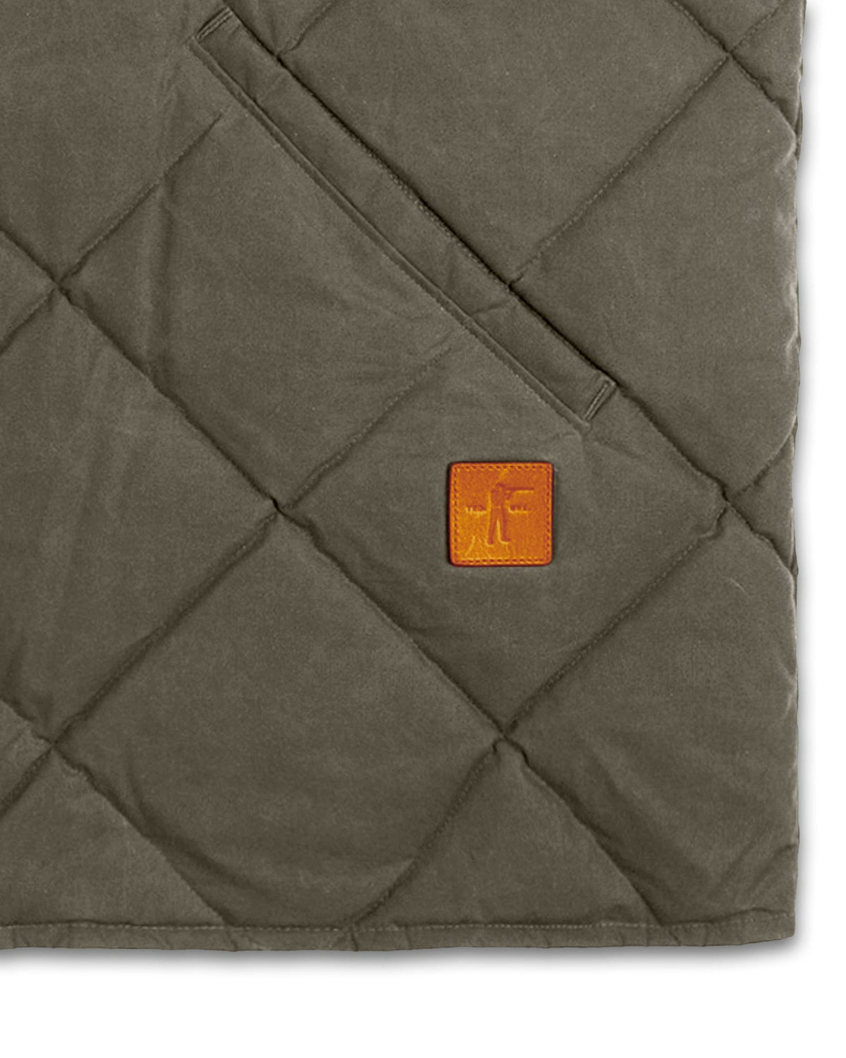 Diamond quilting and leather Arthur patch on the Loden Arthur Down Vest