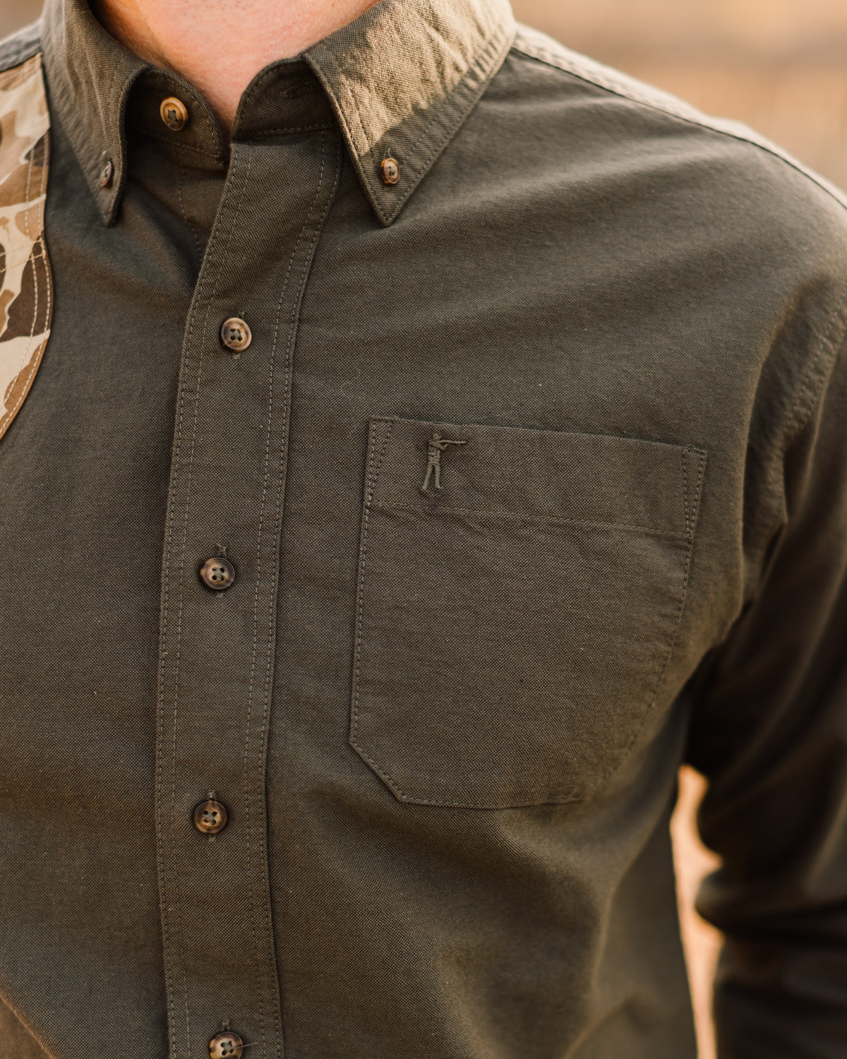 Close-up of the chest pocket and button-down collar on the Moss Oxford Sportsmans Shirt
