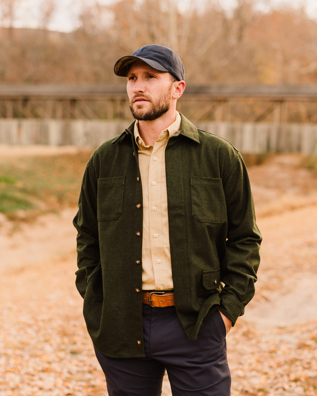 Man standing outdoors in the Loden Green Mariners merino wool overshirt