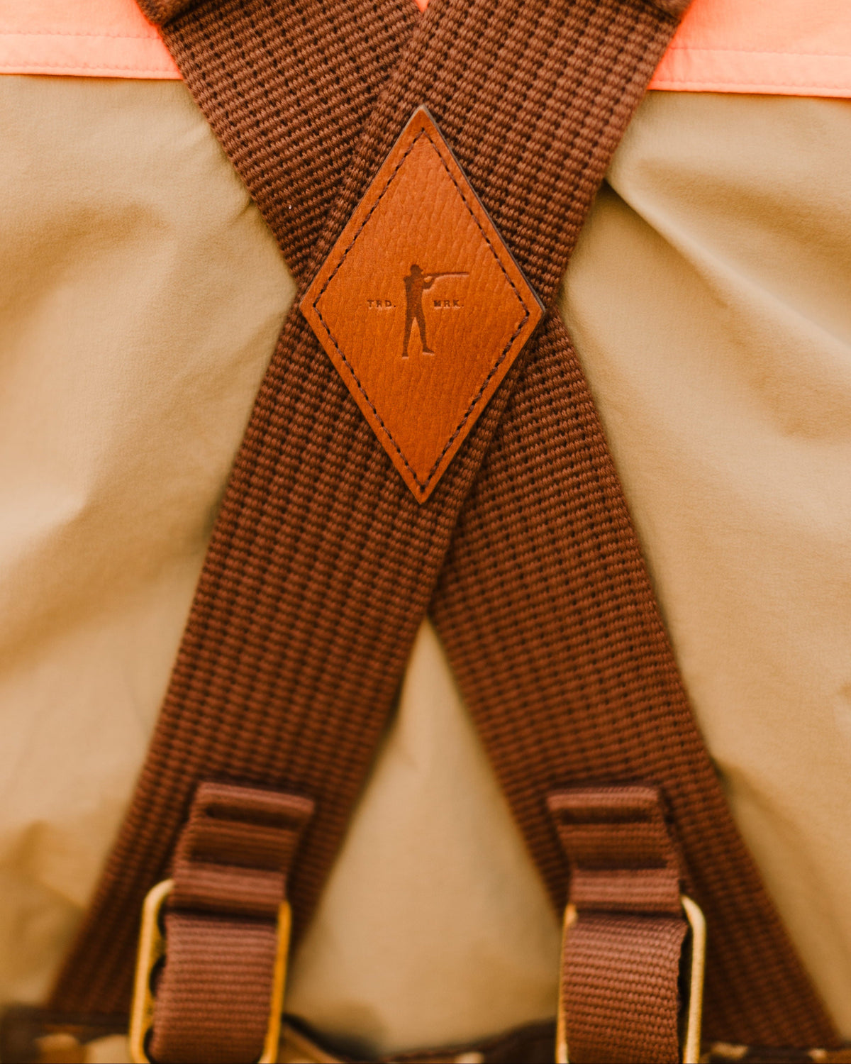 Leather Arthur patch at the strap crossover on the back of the Original Camo Strap Vest