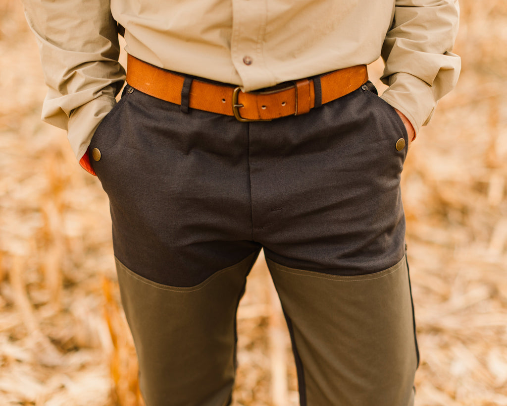 Ball and Buck leather belt worn with waxed field pants, front view