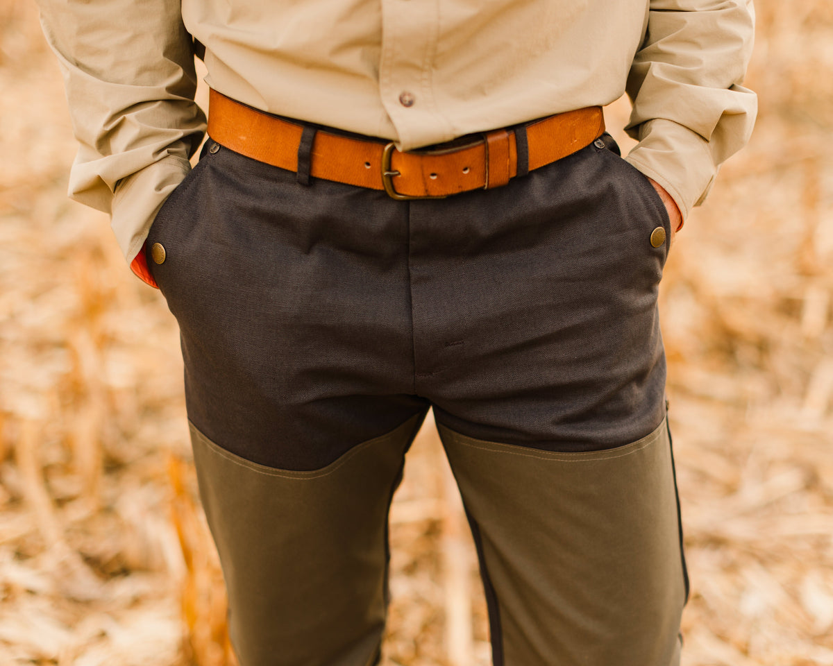 Ball and Buck leather belt worn with waxed field pants, front view