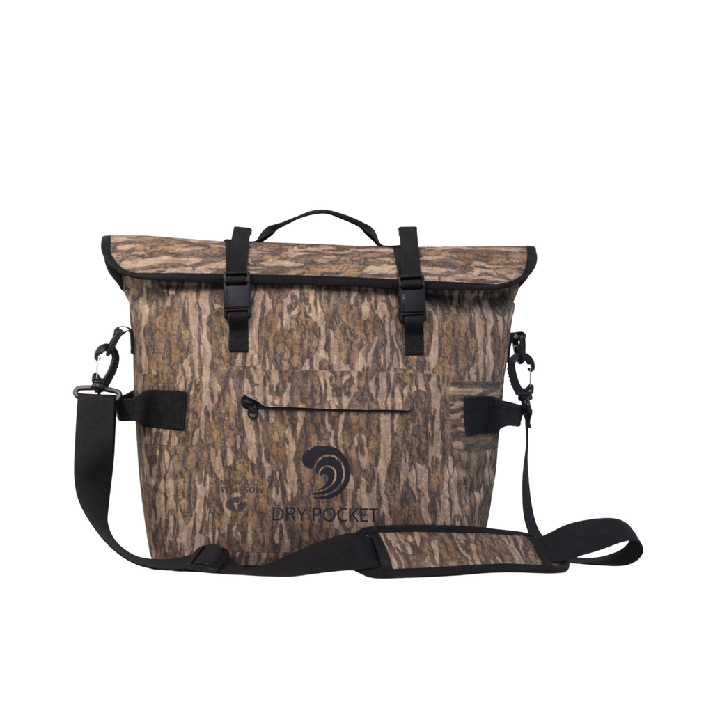 Mossy Oak Bottomland dry bag with waterproof roll-top, shoulder strap, and camo pattern for hunting and outdoor use