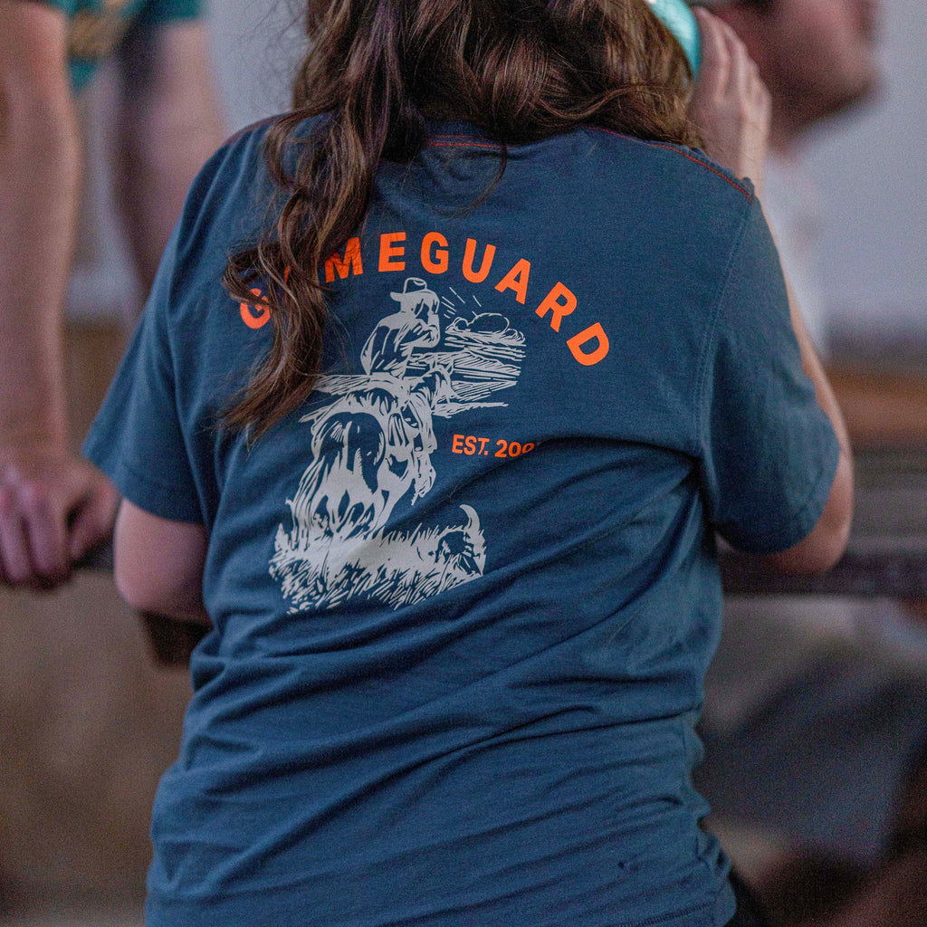 Blue Gameguard hunting t-shirt with orange text and wildlife graphic, ideal for outdoor enthusiasts.