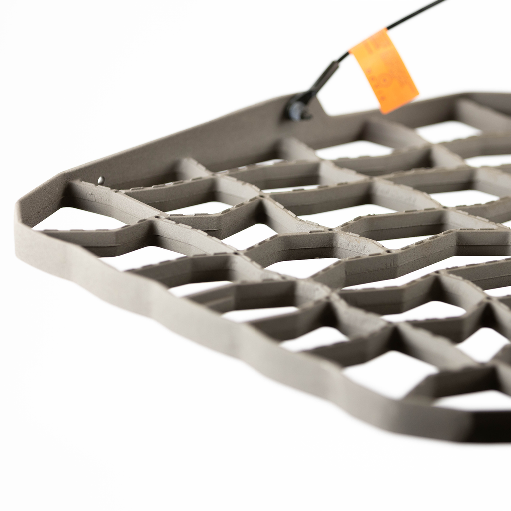 Gray hunting boot mat with hexagonal grip pattern for outdoor use