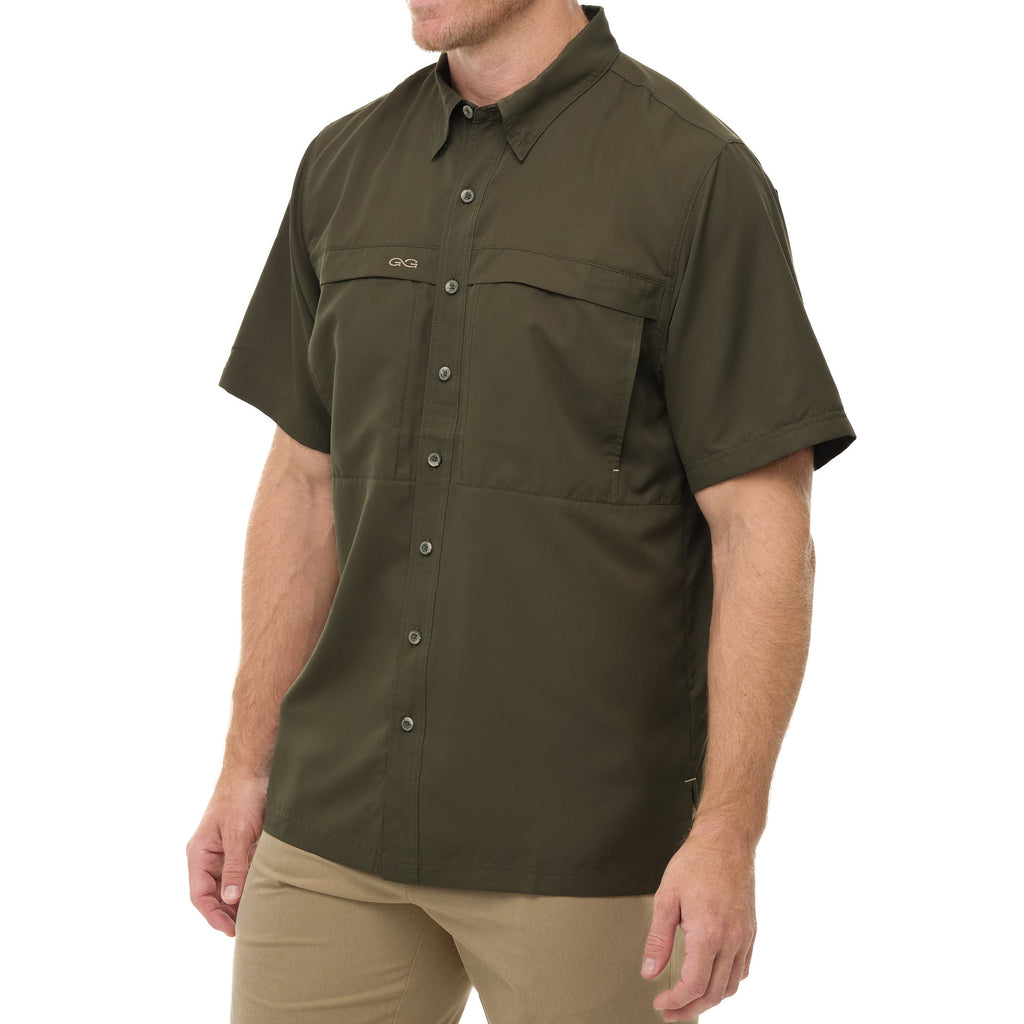 Olive green short-sleeve button-up hunting shirt with chest pockets, ideal for outdoor adventures and field use.