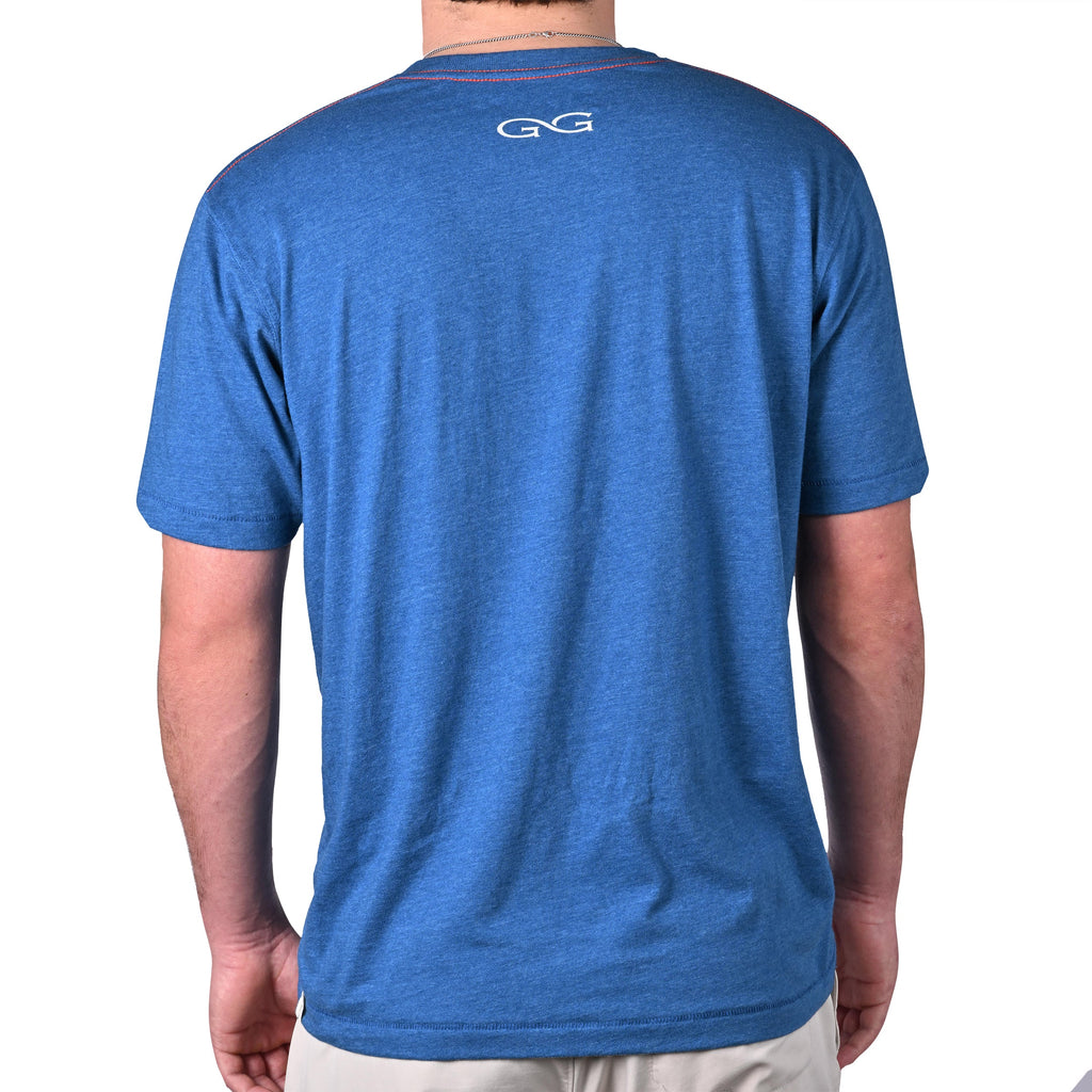 Blue heather short sleeve t-shirt with white logo on back, red stitching detail, outdoor apparel