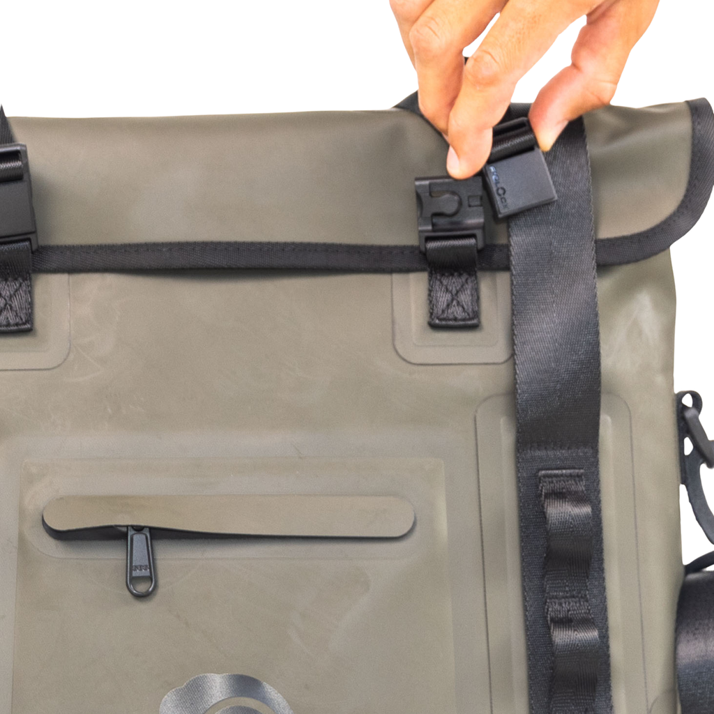 Olive green waterproof dry bag with roll-top closure and black straps for hunting or outdoor gear storage