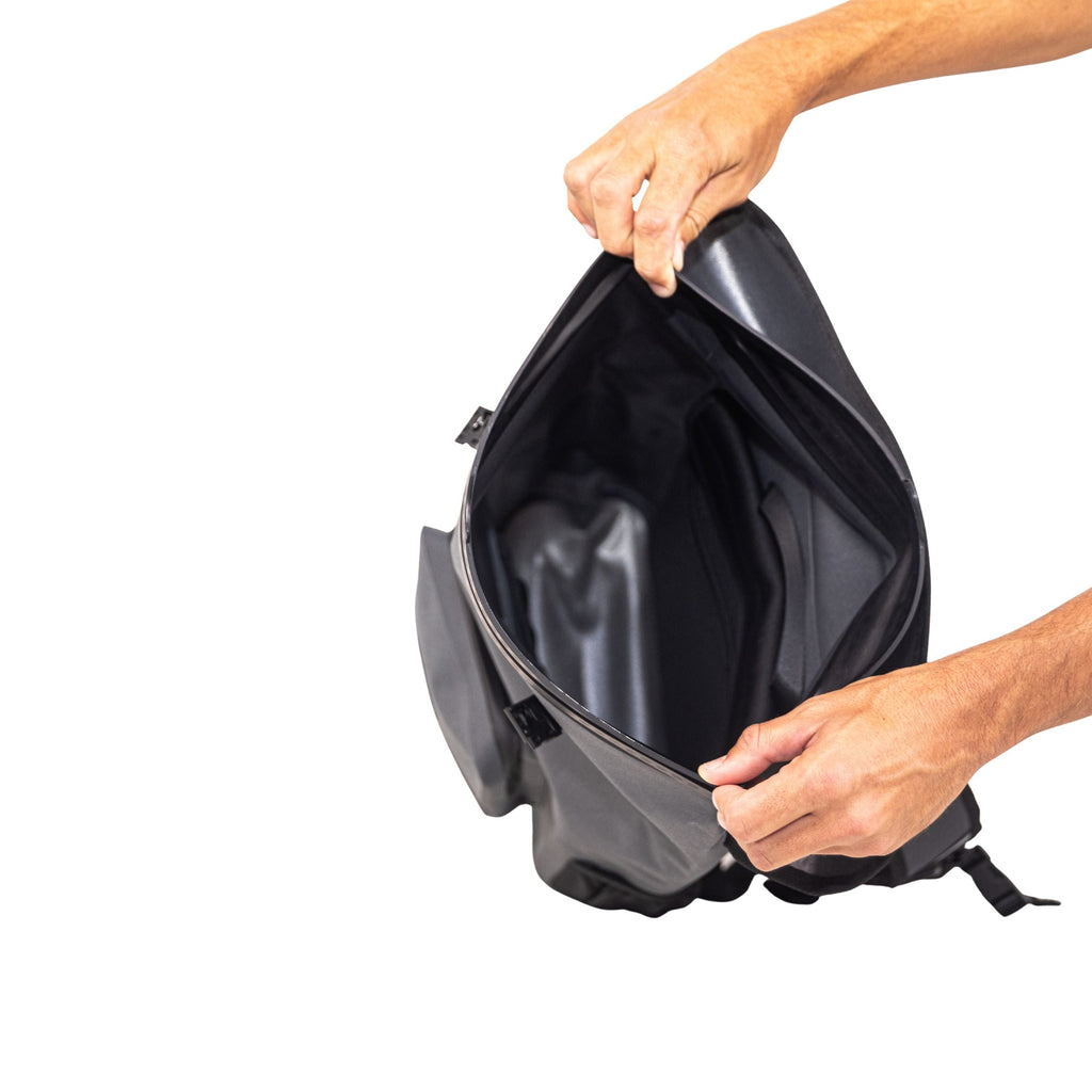 Black waterproof hunting backpack with spacious interior, ideal for outdoor gear storage