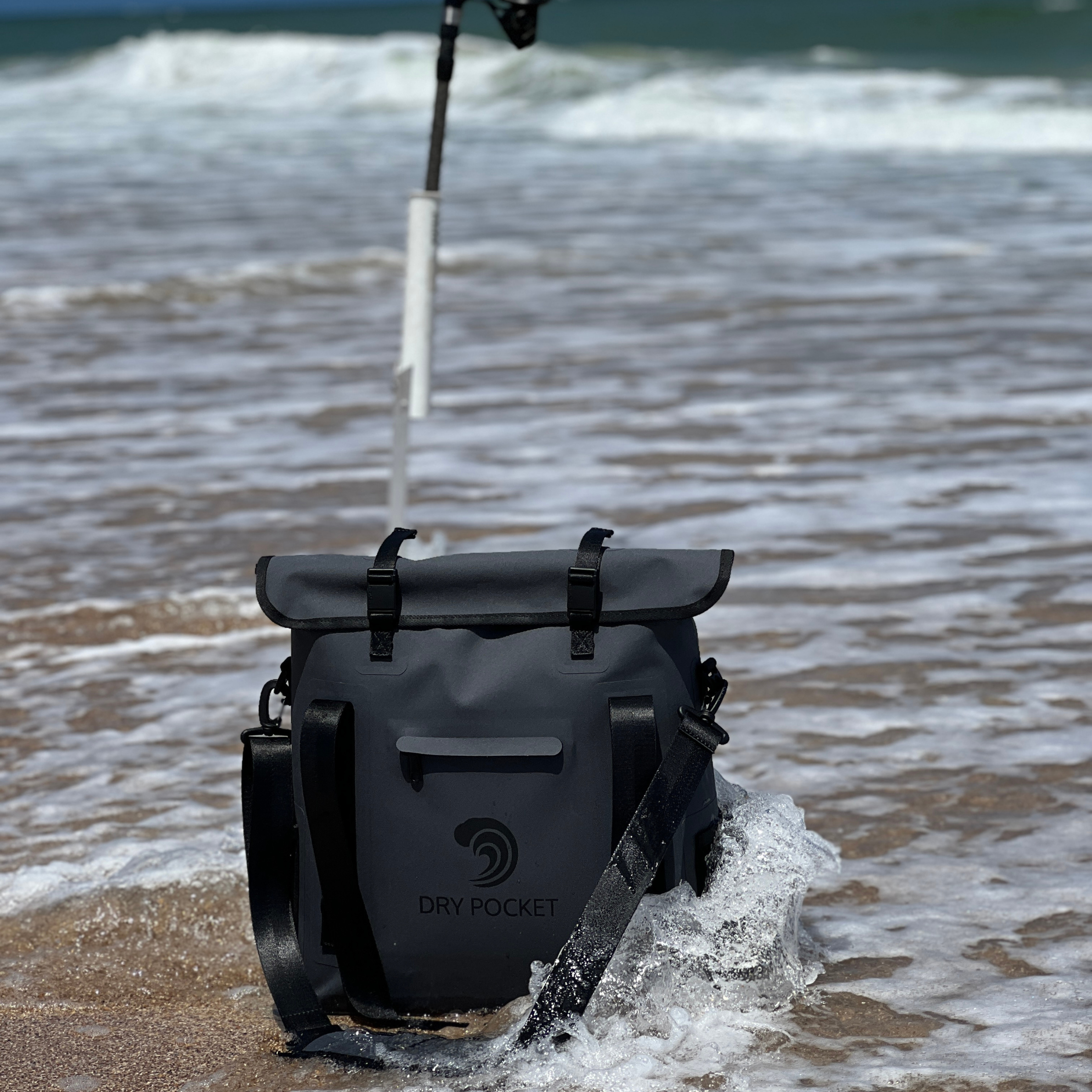 Waterproof dry bag for fishing and outdoor adventures, durable black roll-top design with shoulder straps