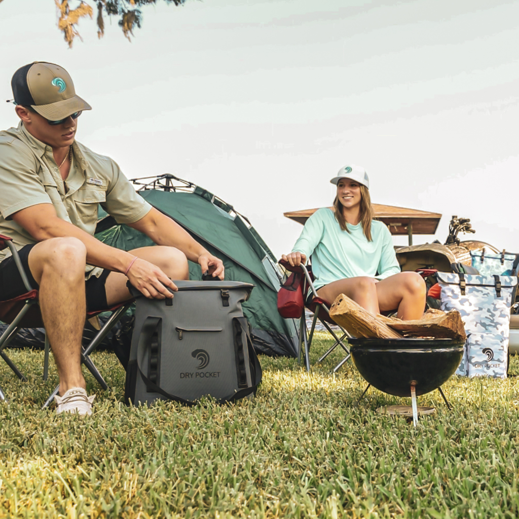Dry Pocket waterproof cooler bag for camping, fishing, and outdoor adventures with camo and gray options