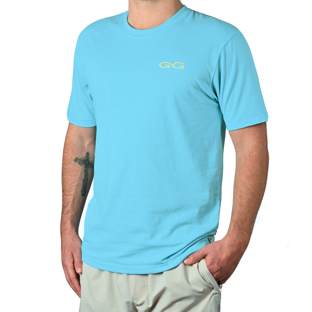 Light blue short sleeve t-shirt with yellow GG logo, casual outdoor wear for hunting or fishing