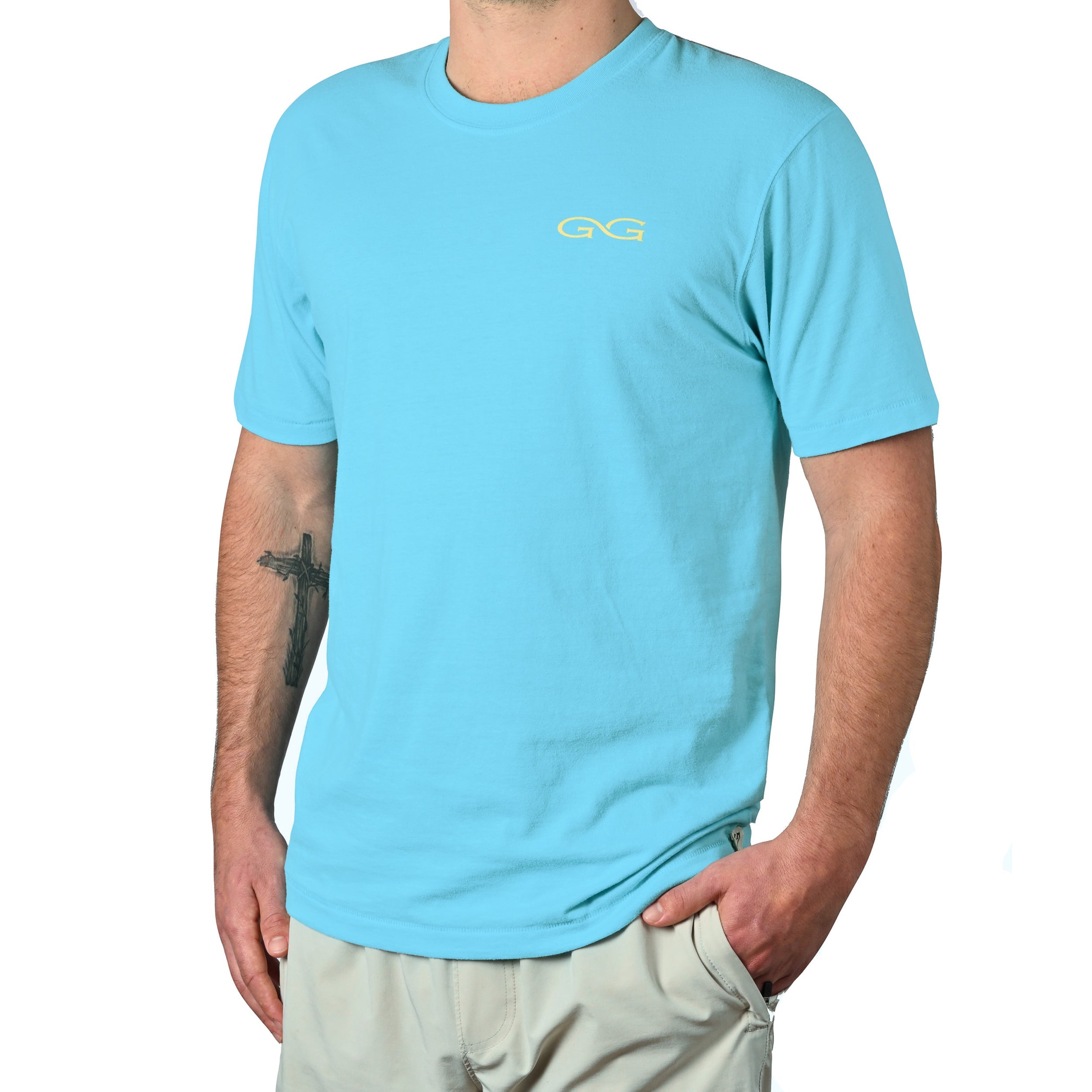 Light blue short sleeve t-shirt with yellow GG logo, casual outdoor wear for hunting or fishing