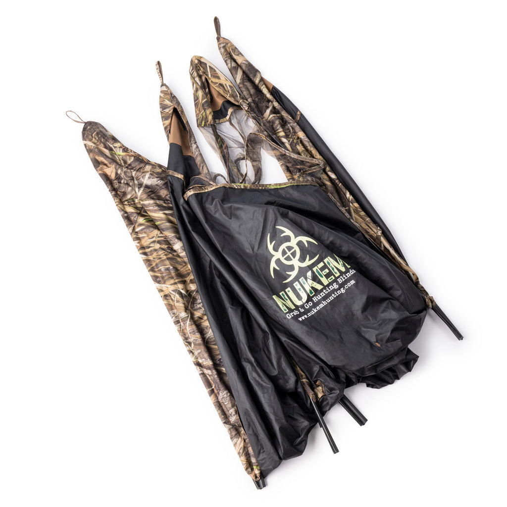 Nukem Grab & Go Hunting Blind in marsh camo pattern with black base and mesh windows for concealment